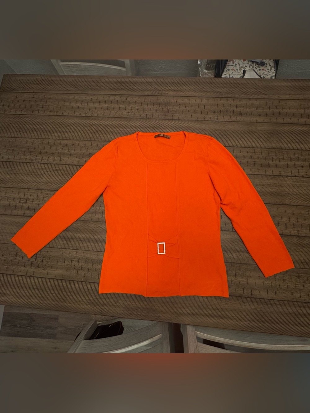 Belldini Bright Orange Long Sleeve Knit Top with Front Buckle Bow Detail